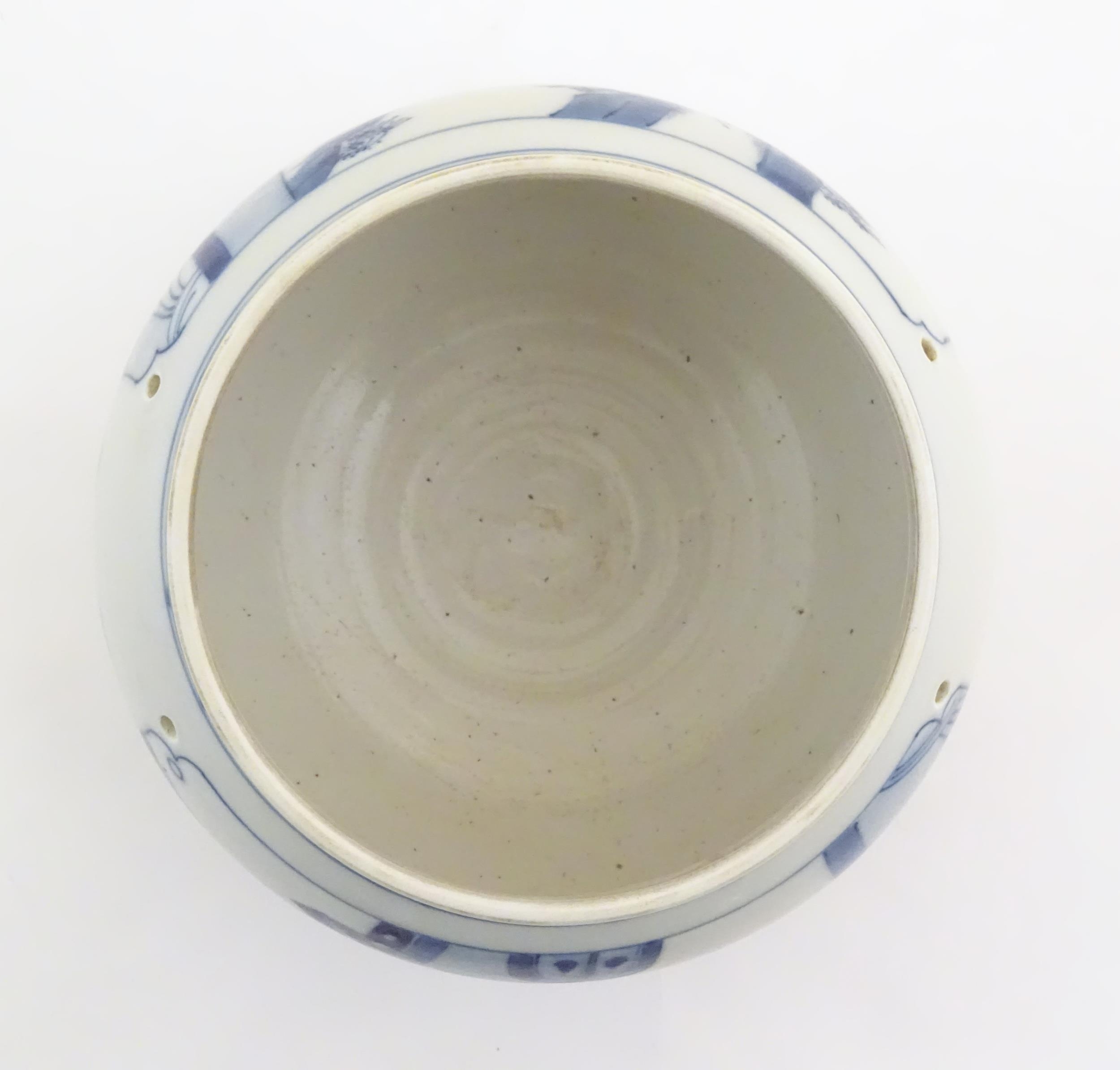 A Chinese blue and white planter with four drilled hanging holes, decorated with panelled decoration - Image 6 of 6