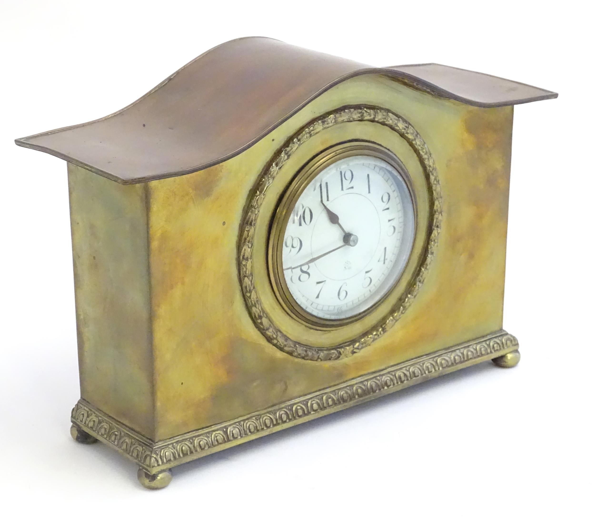 A mantle clock by Japy freres the shaped brass case with enamel dial marked signed Japy freres mark. - Image 4 of 18