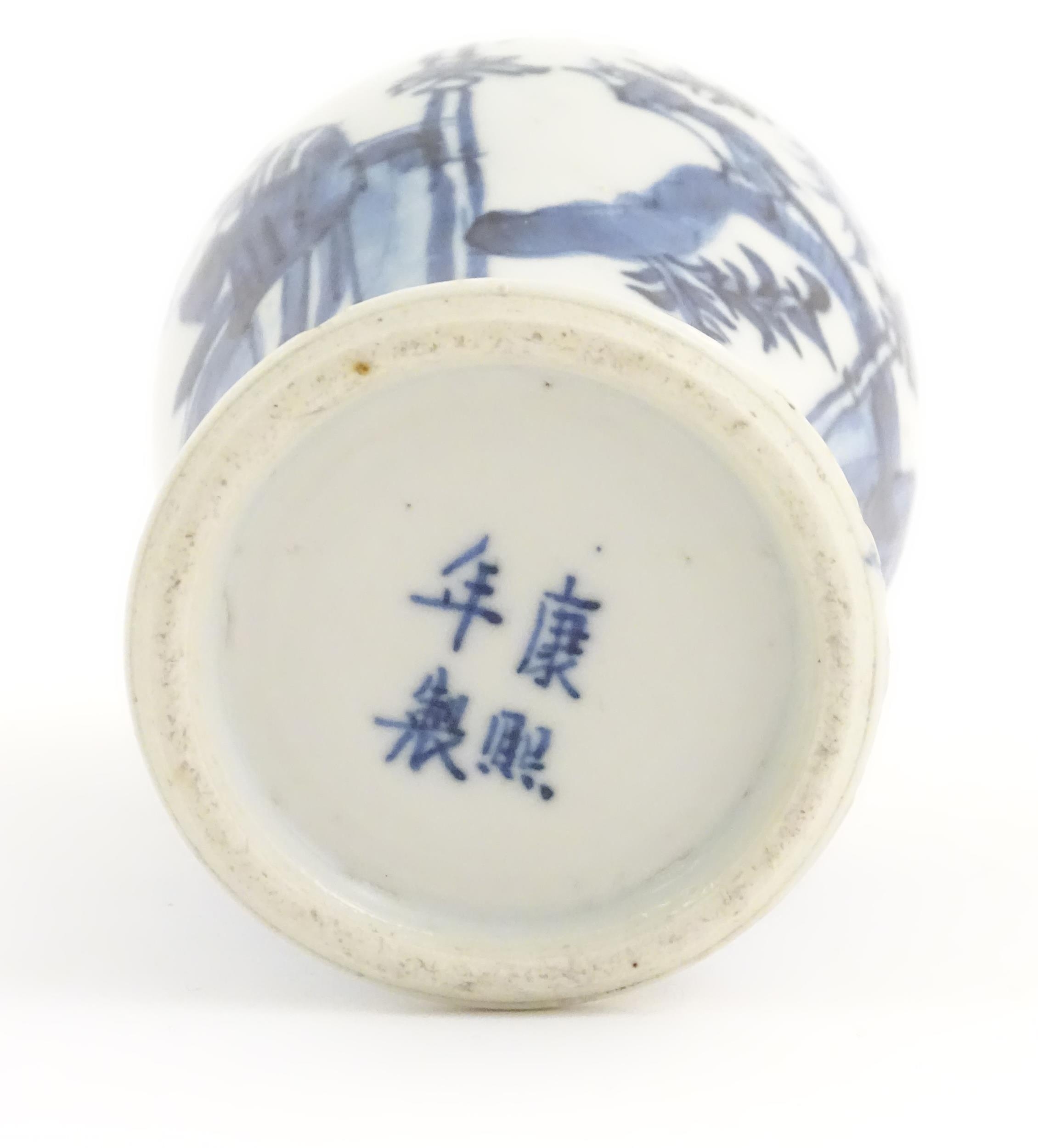 A small Chinese blue and white vase decorated with figures on a garden terrace with flowers and - Image 7 of 7