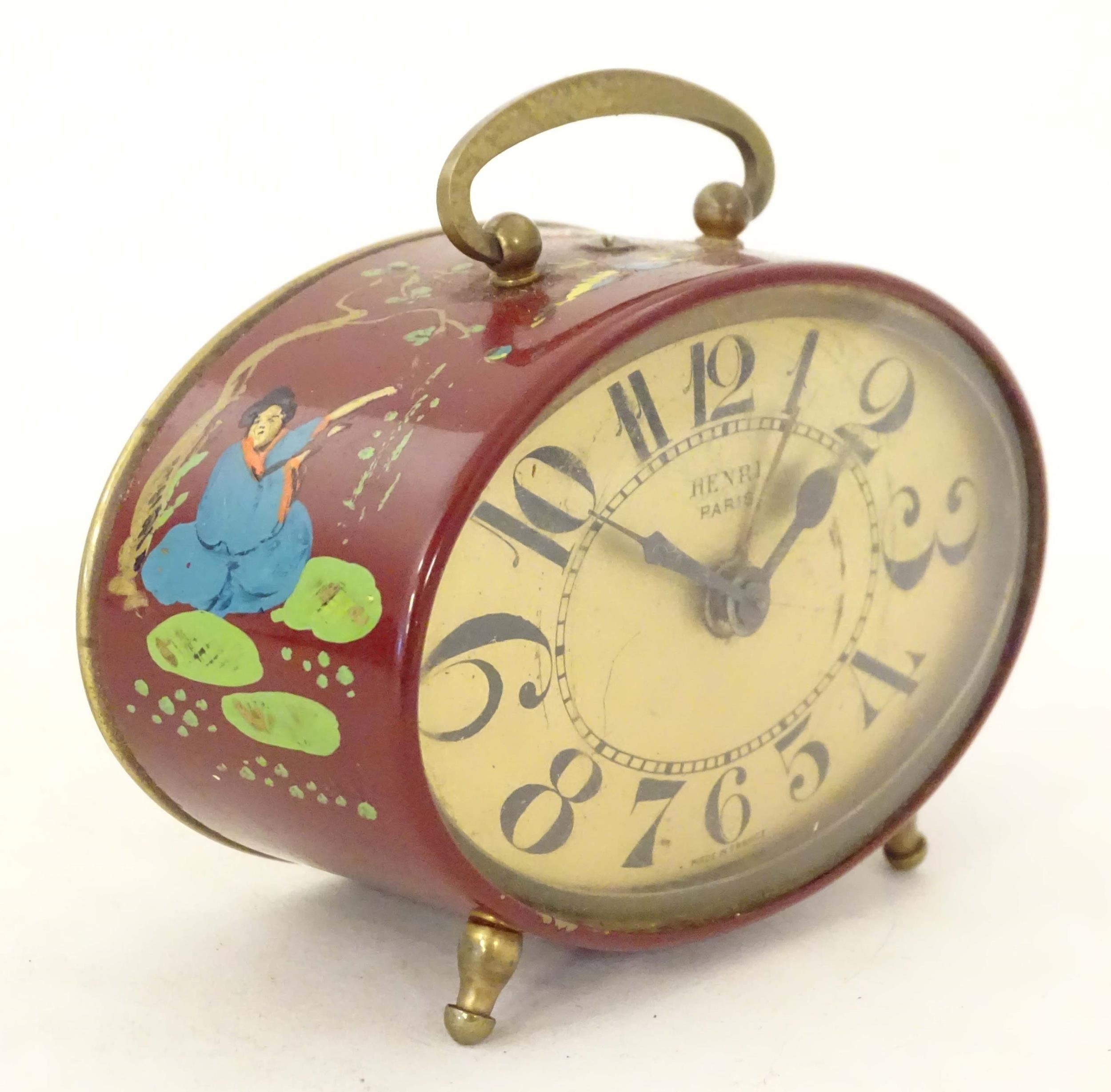 A 20thC French red lacquered travelling alarm clock with chinoiserie decoration. The dial signed - Image 3 of 12