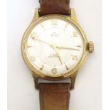 A mid 20thC wrist watch by Smiths , de luxe model A456 , fitted with a leather strap. Please