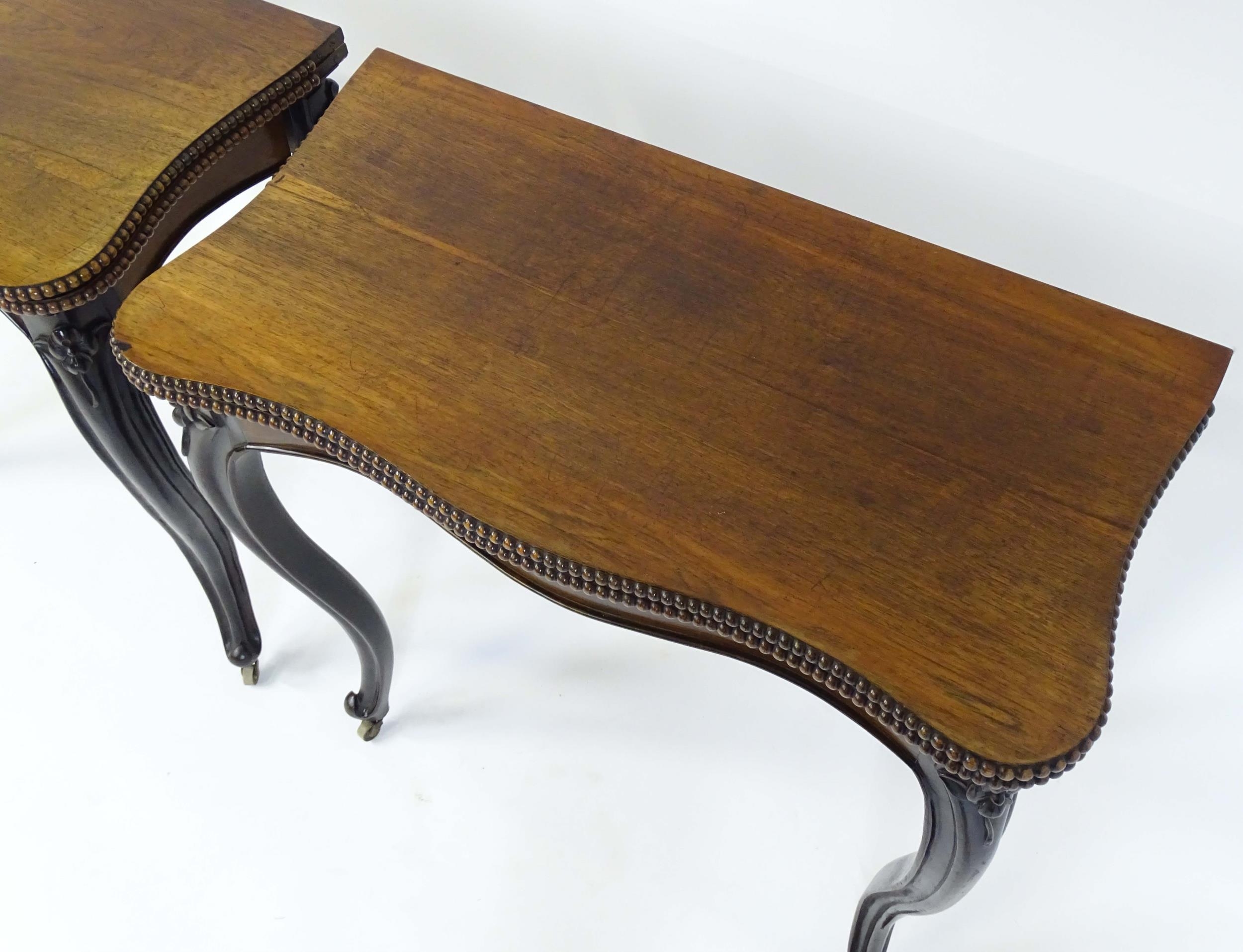 A pair of 19thC rosewood card tables of serpentine form, having beaded edges above floral carved - Image 11 of 18