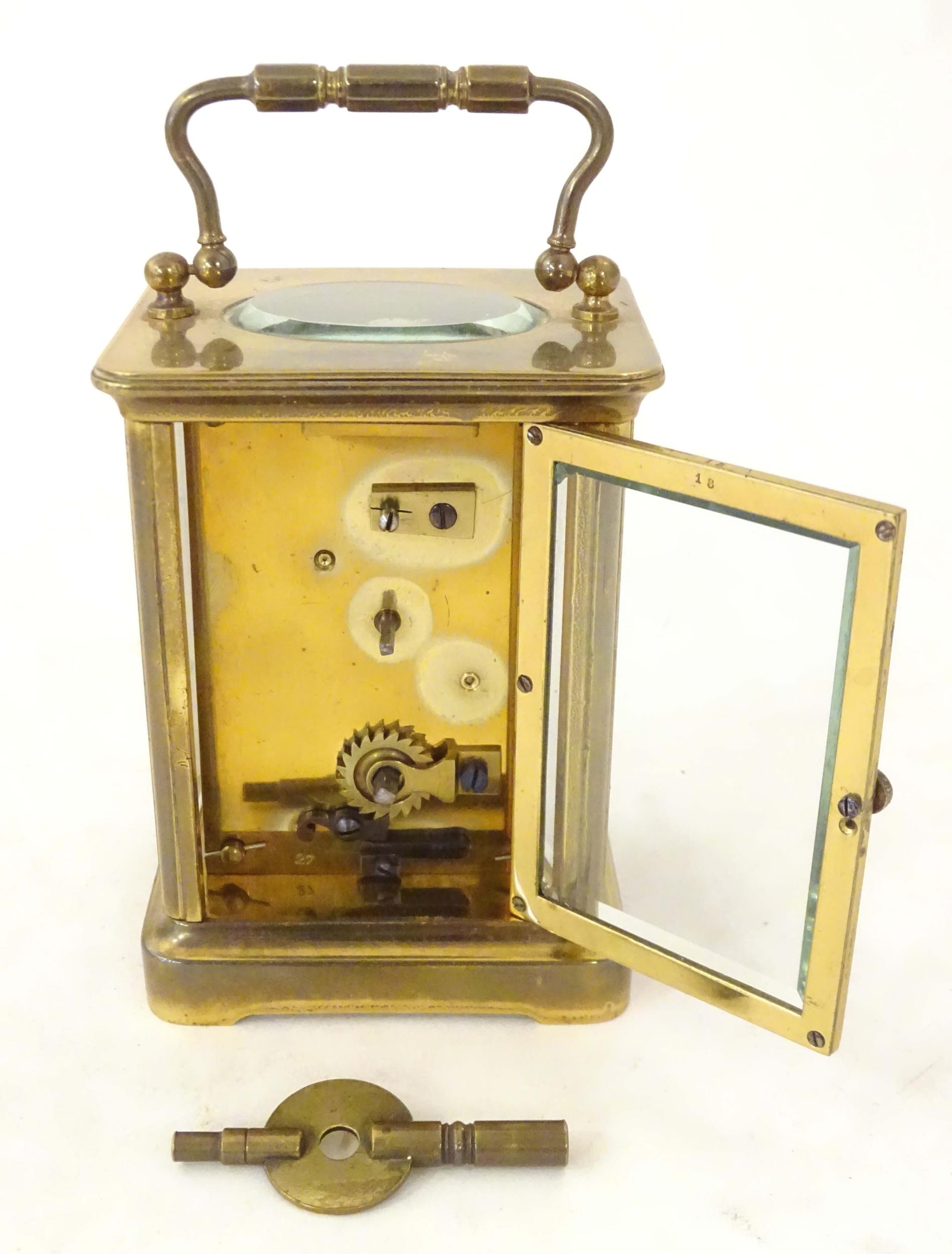 A carriage clock with white enamel dial. 5 3/4" high 'overall. Please Note - we do not make - Image 5 of 6