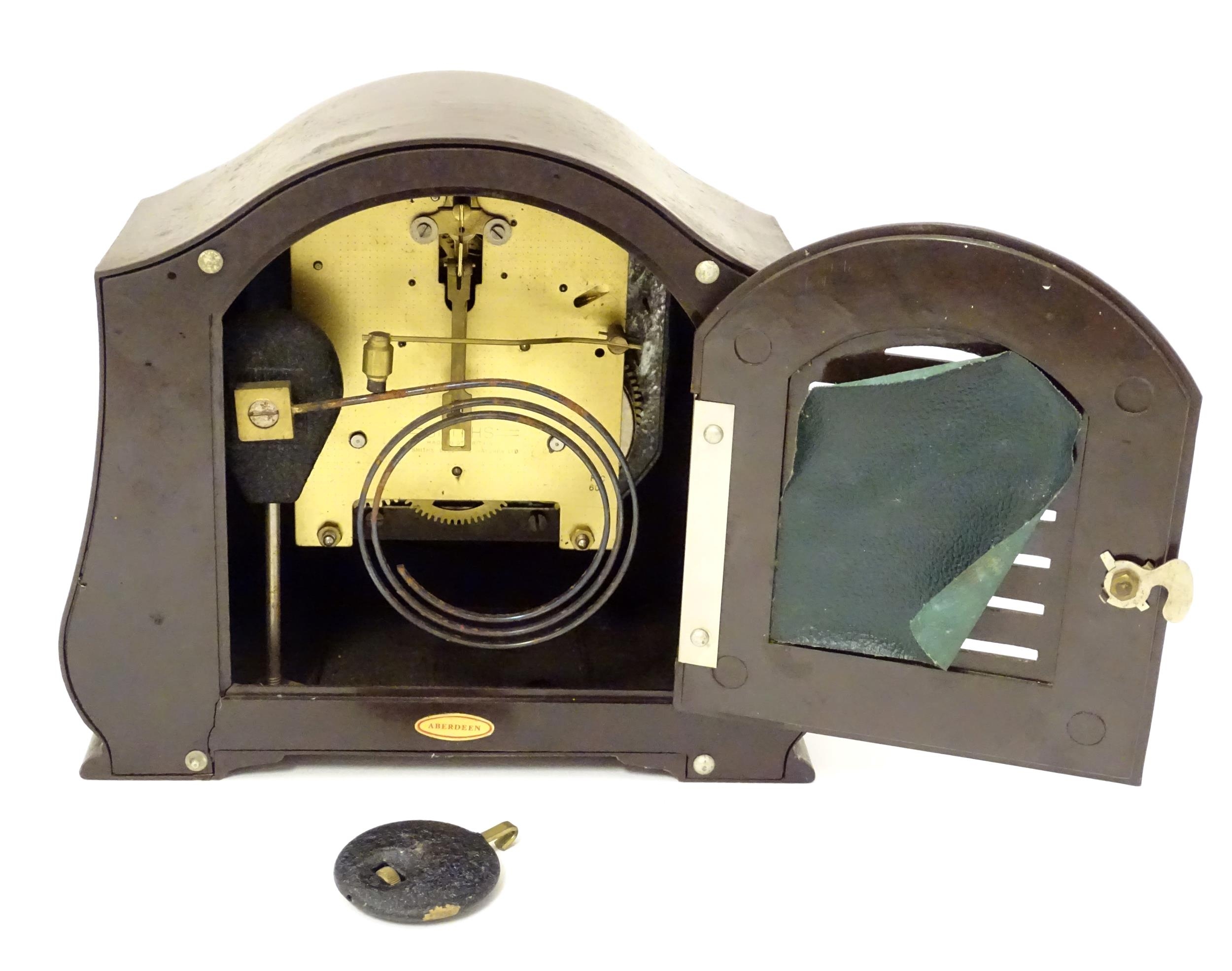 A Bakelite cased mantel clock by Smiths. 7 1/4" high Please Note - we do not make reference to the - Image 11 of 13