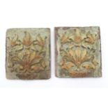 A pair of early 19thC carved wooden plaques of rectangular form with relief foliate and urn detail