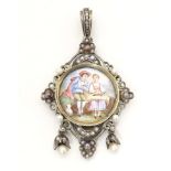 A white metal pendant locket set with seed pearls and having hand painted enamel decoration to