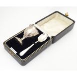 A silver egg cup and spoon, hallmarked Birmingham 1939, maker Arthur Price & Co, cased. The case