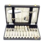 A cased silver plate six place set of fish eaters and servers with Art Deco style decoration. Please