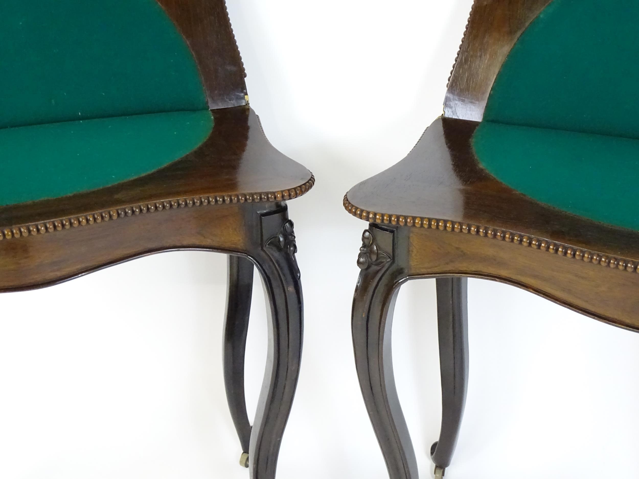 A pair of 19thC rosewood card tables of serpentine form, having beaded edges above floral carved - Image 5 of 18