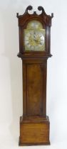 A Scottish 19thC mahogany 8-day long case clock, the brass dial with subsidiary seconds dial and