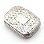 A Geo III silver vinaigrette with engraved decoration and floral pierced grille within hallmarked