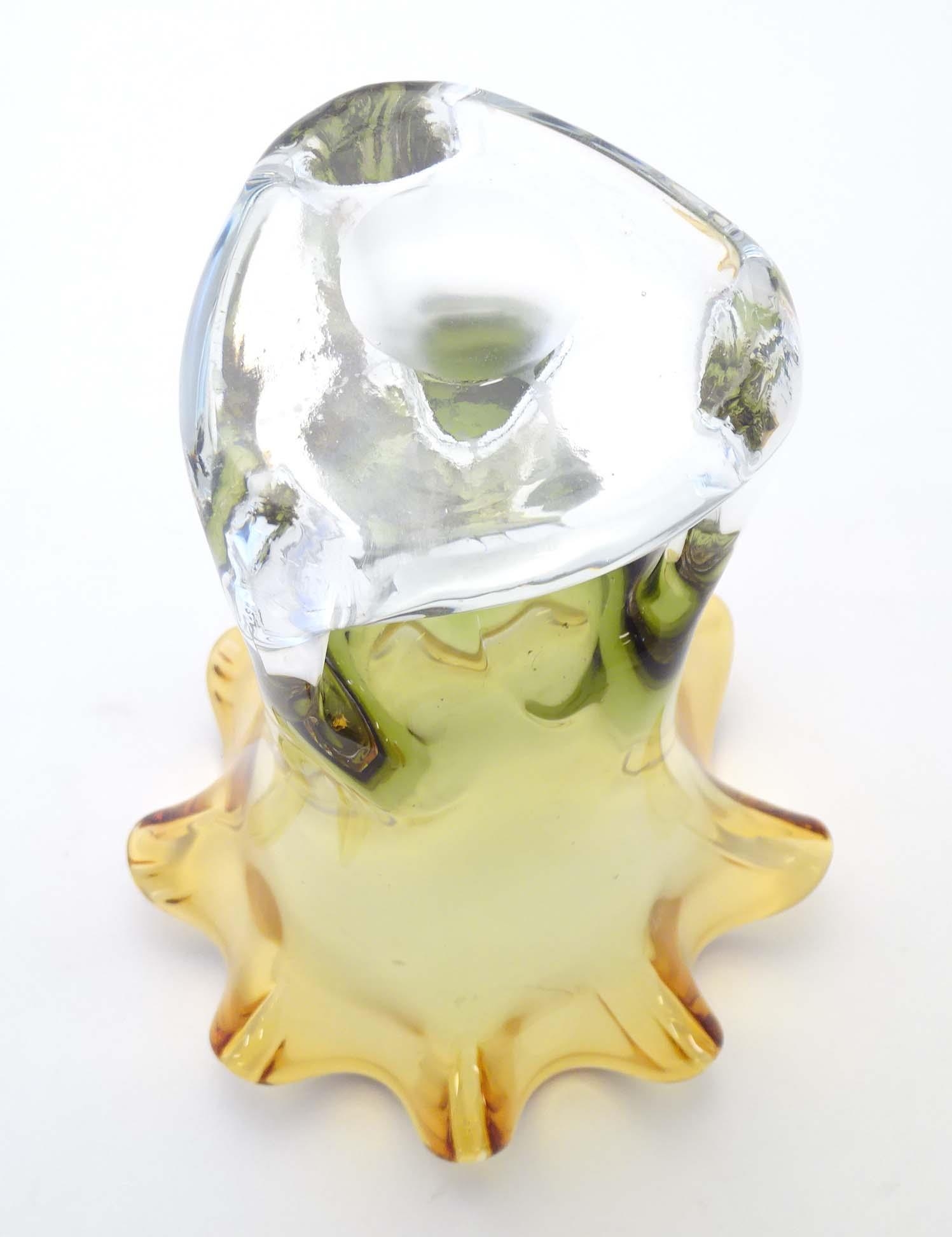 A studio glass vase with amber flared rim and body on a open clear glass base. Approx 11" high - Image 3 of 7