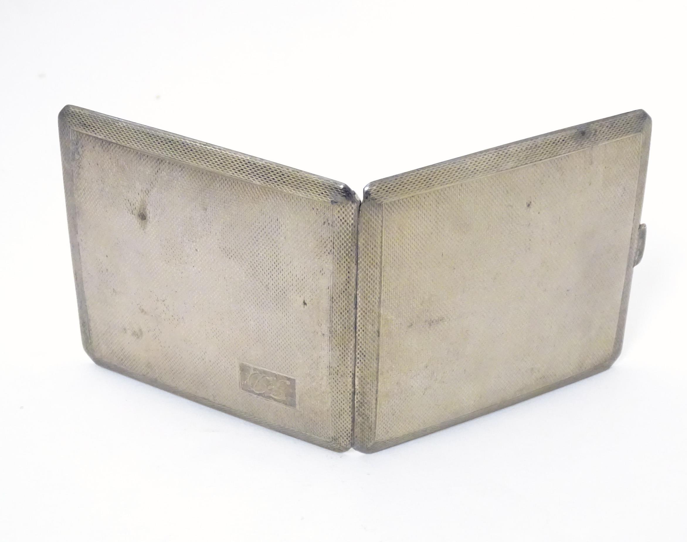 A silver cigarette case with engine turned decoration and gilded interior, hallmarked Birmingham - Image 7 of 10