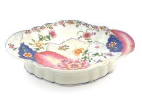 A Chinese export famille rose footed serving dish of lozenge form in the tobacco leaf pattern with