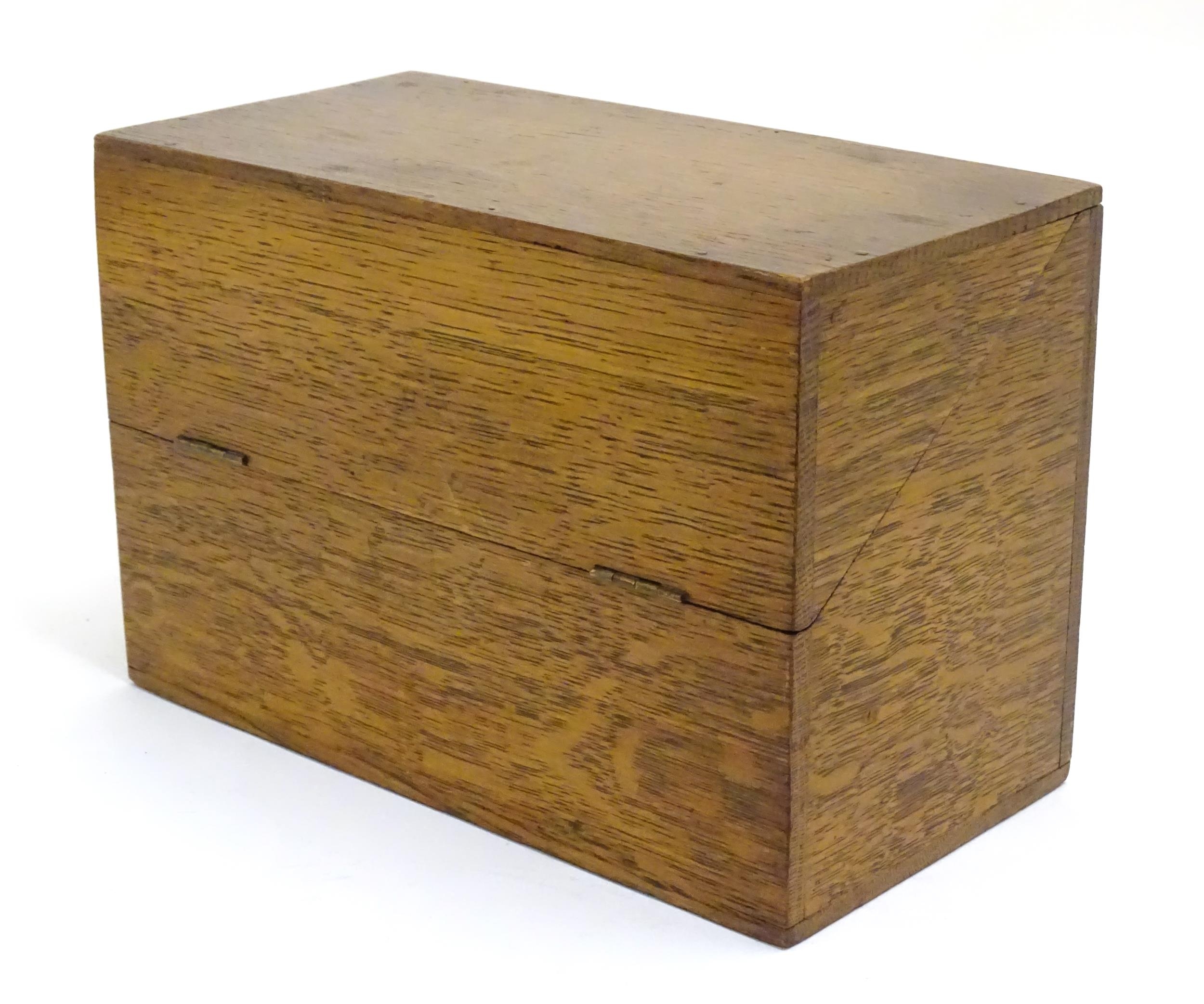 A 20thC oak correspondence / address box. Approx. 6" high x 8 3/4" wide x 4 1/2" deep Please - Image 13 of 16