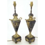 A pair of Continental table lamps, the faux marble with applied gilt detail having twin handles