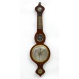 A mahogany wheel barometer with satinwood stringing, thermometer reading freezing to blood heat