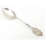 A silver teaspoon the handle surmounted by crest for London Rifle Brigade, hallmarked Sheffield