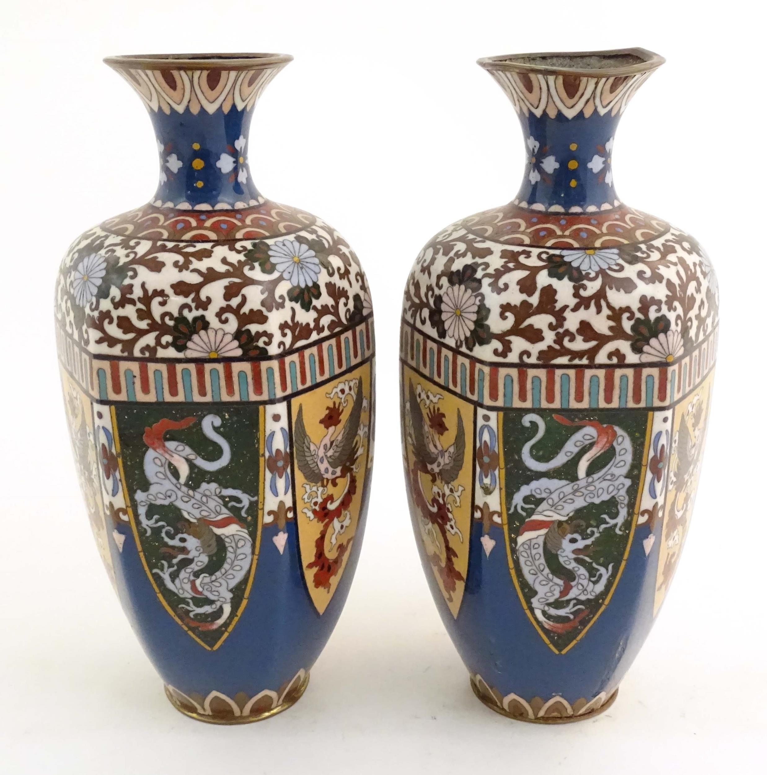 A pair of Oriental cloisonne vases decorated with panels of dragons and phoenix birds, the shoulders - Image 4 of 7