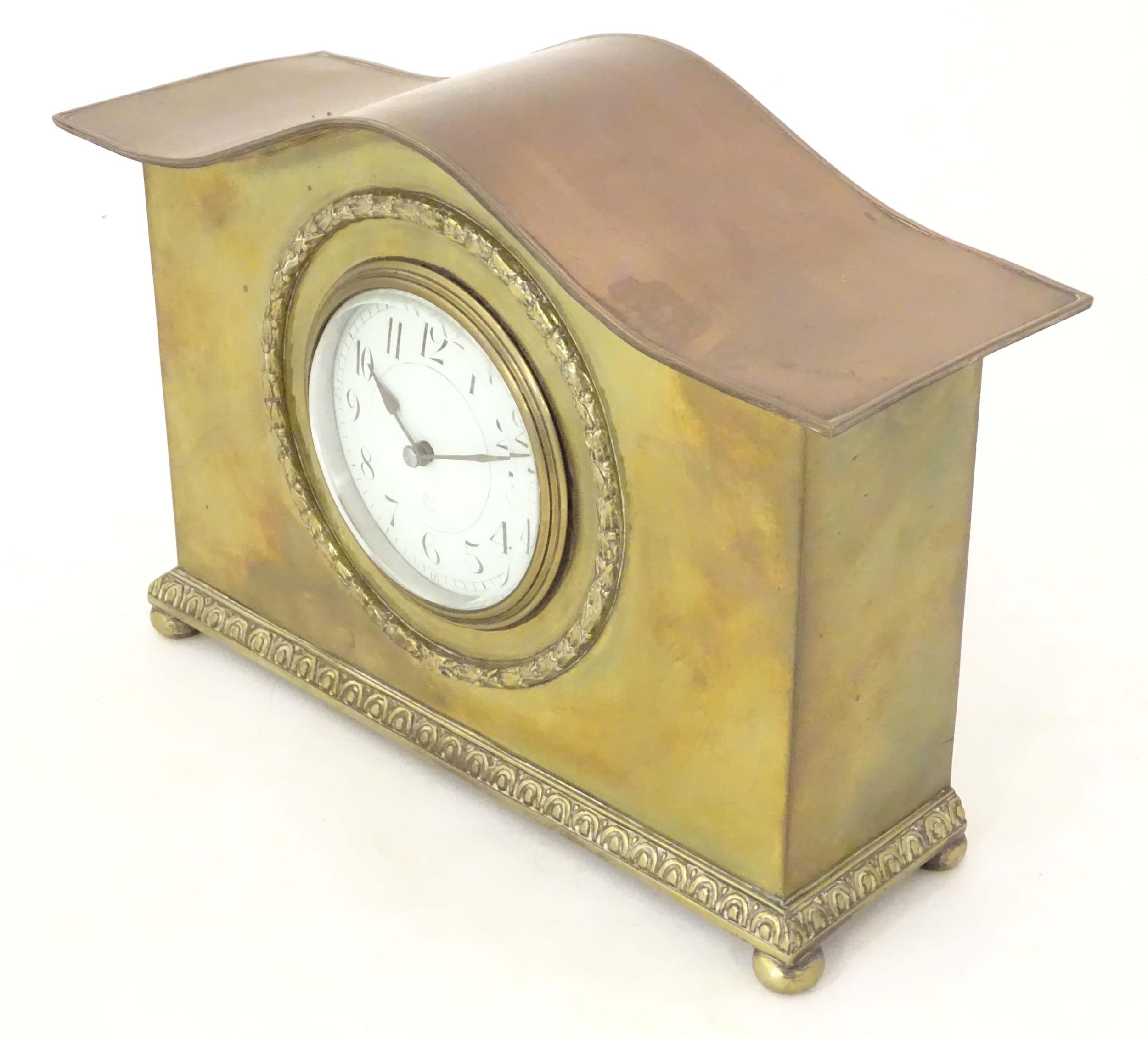 A mantle clock by Japy freres the shaped brass case with enamel dial marked signed Japy freres mark. - Image 9 of 18