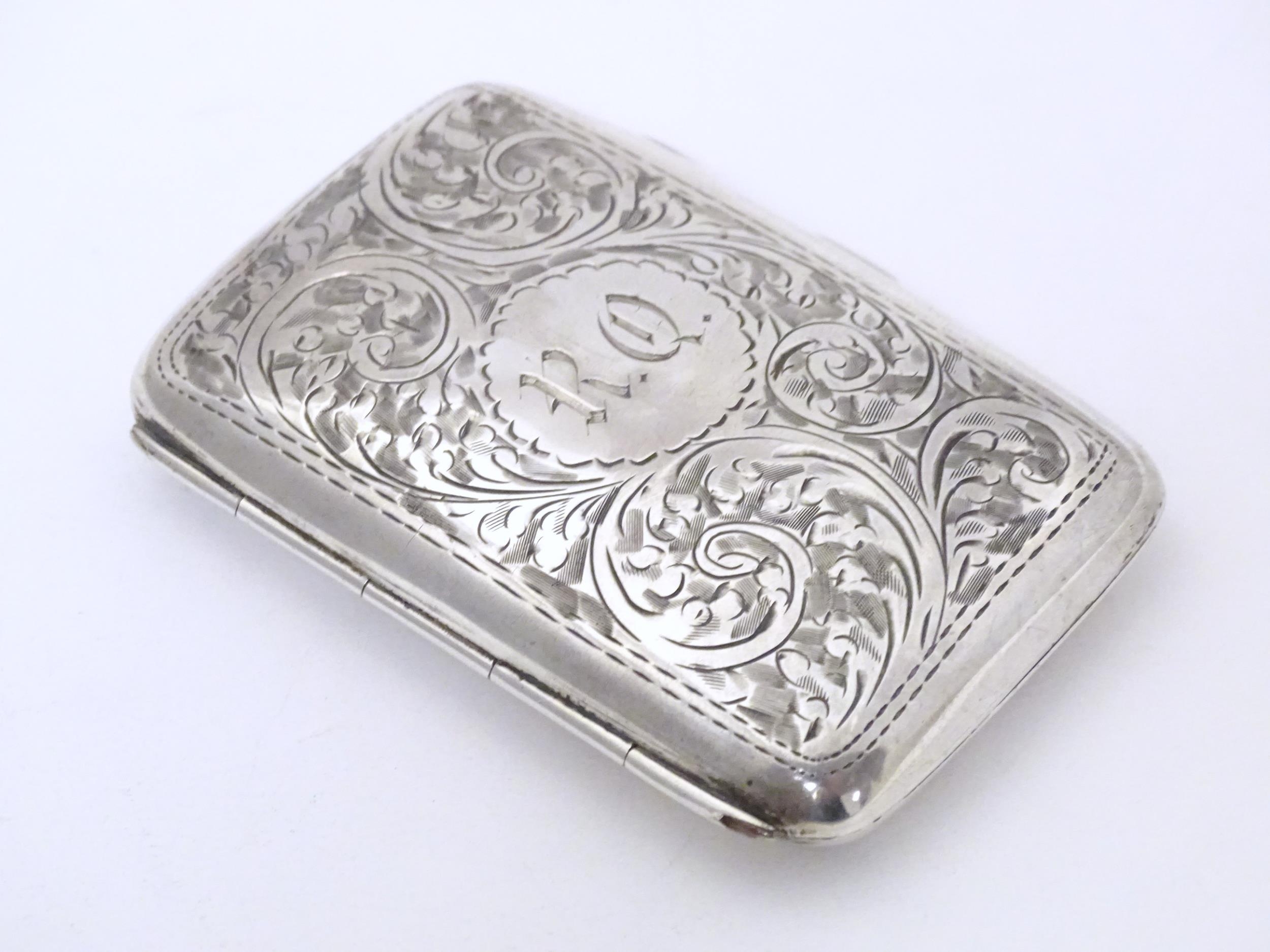 A silver cigarette case with engraved decoration, hallmarked Birmingham 1919, maker Joseph Gloster - Image 3 of 8