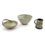 Three assorted studio pottery items to include a bowl with an applied single handle, inscribed