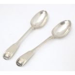 A pair of Geo IV Scottish silver Fiddle and Shell pattern teaspoons, hallmarked Edinburgh 1823,