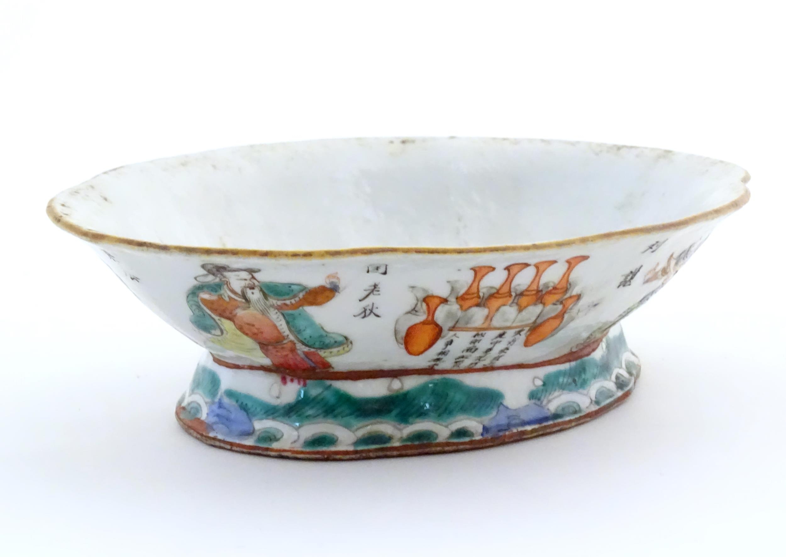 A Chinese footed bowl of lozenge form decorated with figures, vases and Character marks / script. - Image 4 of 6