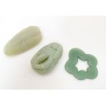 Three various carved jade coloured pendants. the longest 2 1/2" long (3) Please Note - we do not