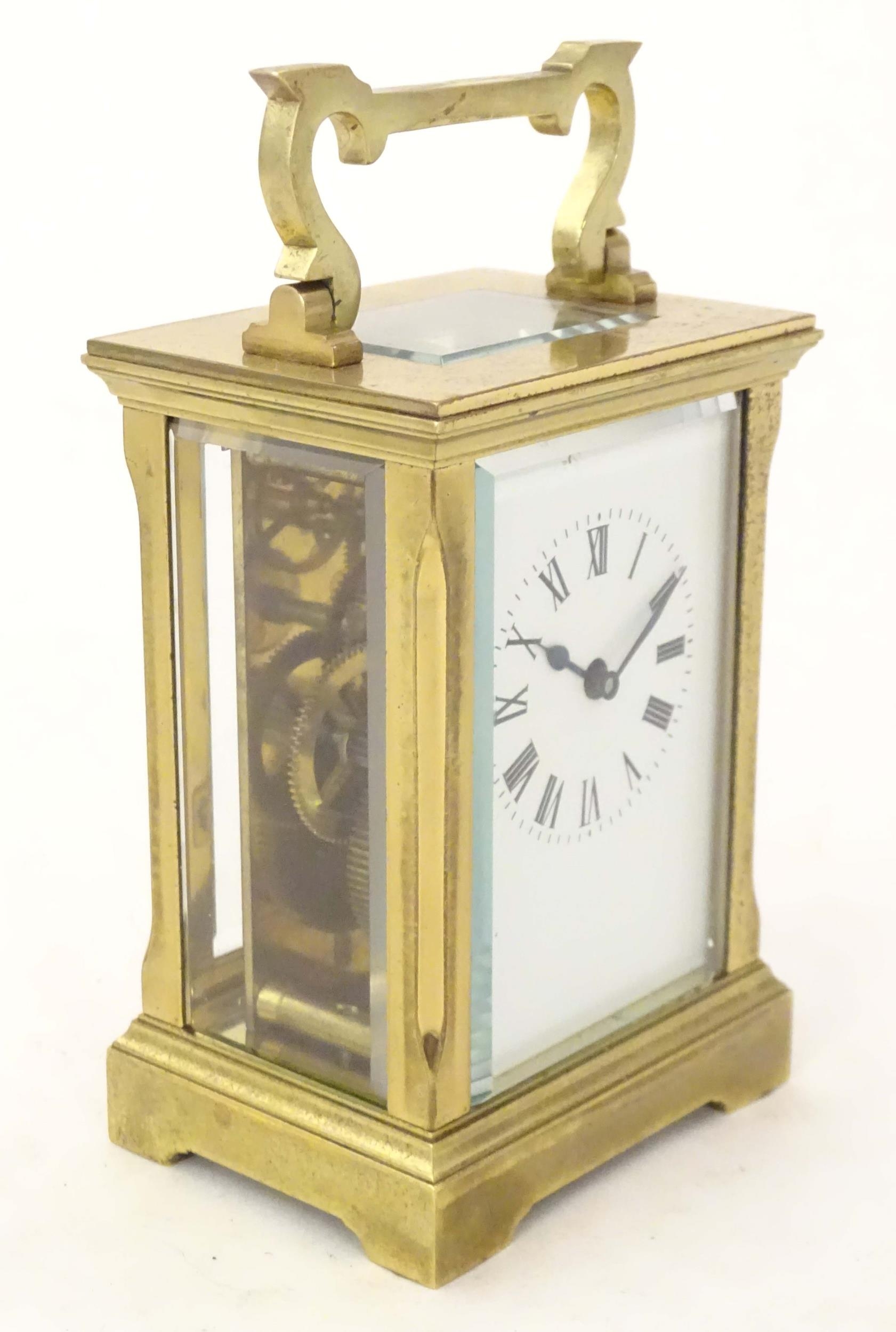 A brass carriage cock with white enamel dial enamelled dial set with Roman numerals, the backplate - Image 3 of 9