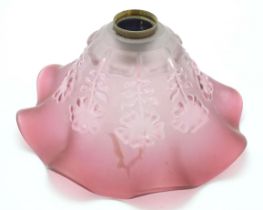 A glass light shade with floral and frilled decoration Approx. 7" diameter x 3 1/4" high Please Note