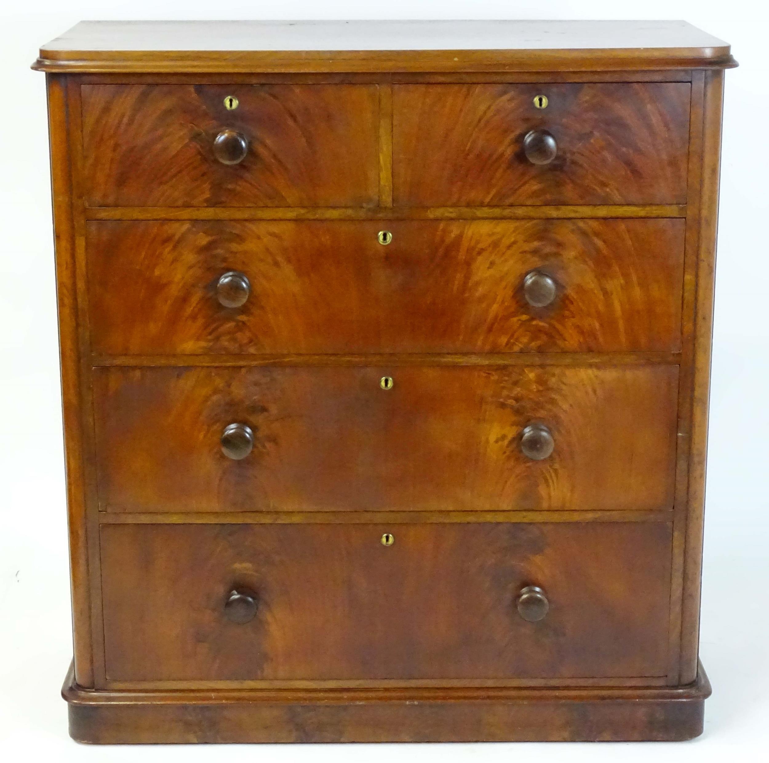 A large Victorian mahogany chest of drawers with a moulded top above two short over three long - Image 8 of 13