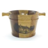 A 19thC Mauchline ware model of a milk pail with banded detail, decorated with a vignette