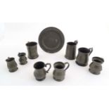 A quantity of pewter items, comprising two Victorian pint tankards, an early 20thC pint tankard,