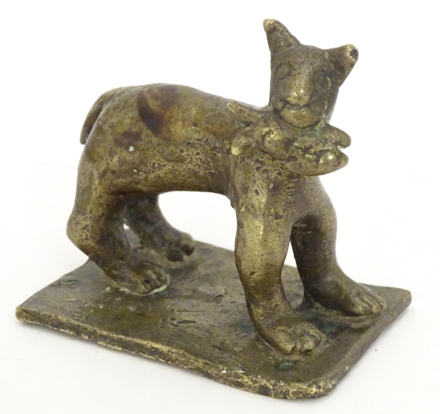 An 18th / 19th century naive bronze model of a standing cat with a fish, on a rectangular base. - Image 3 of 7
