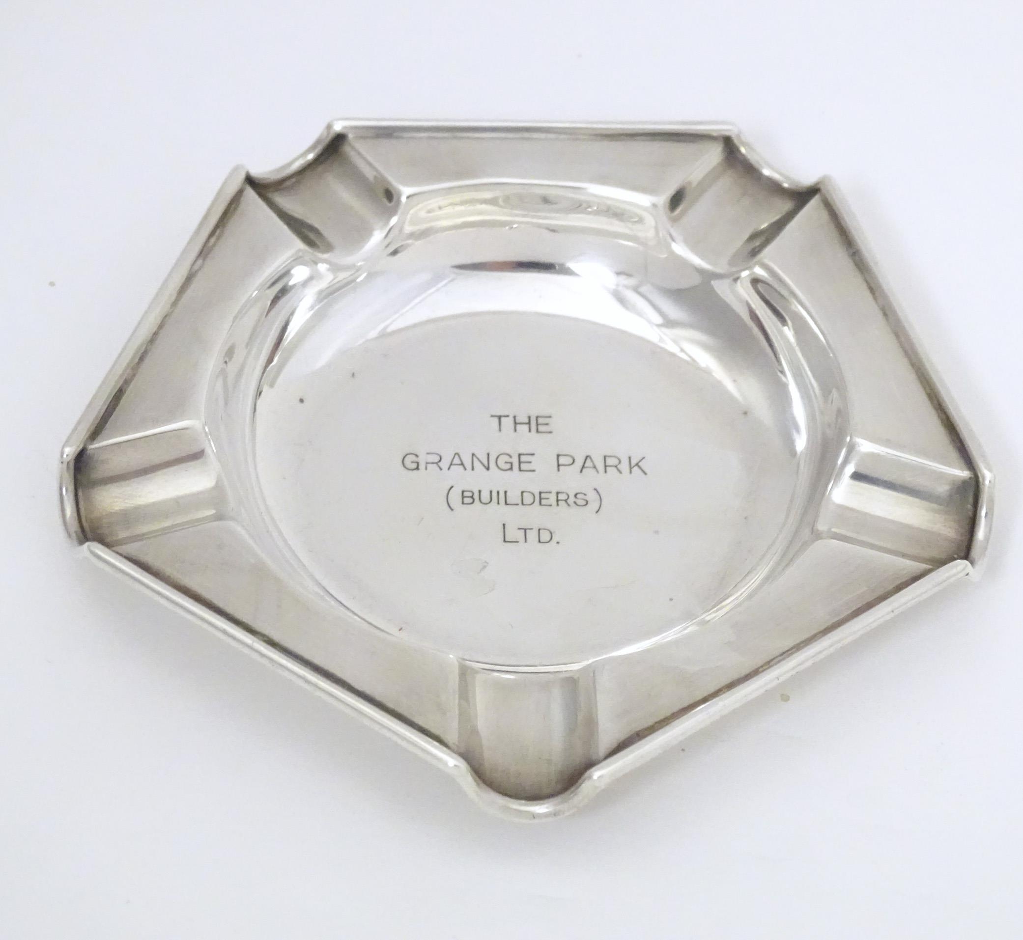 An Art Deco silver ashtray engraved to centre The Grange Park (Builders Ltd.) hallmarked London - Image 2 of 5