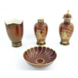 Four items of Carlton Ware in the pattern Rouge Royale to include a vase and cover, bowl, vase, etc.