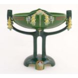 A Continental Eichwald Art Nouveau / Secessionist majolica style pedestal centrepiece with fruit and