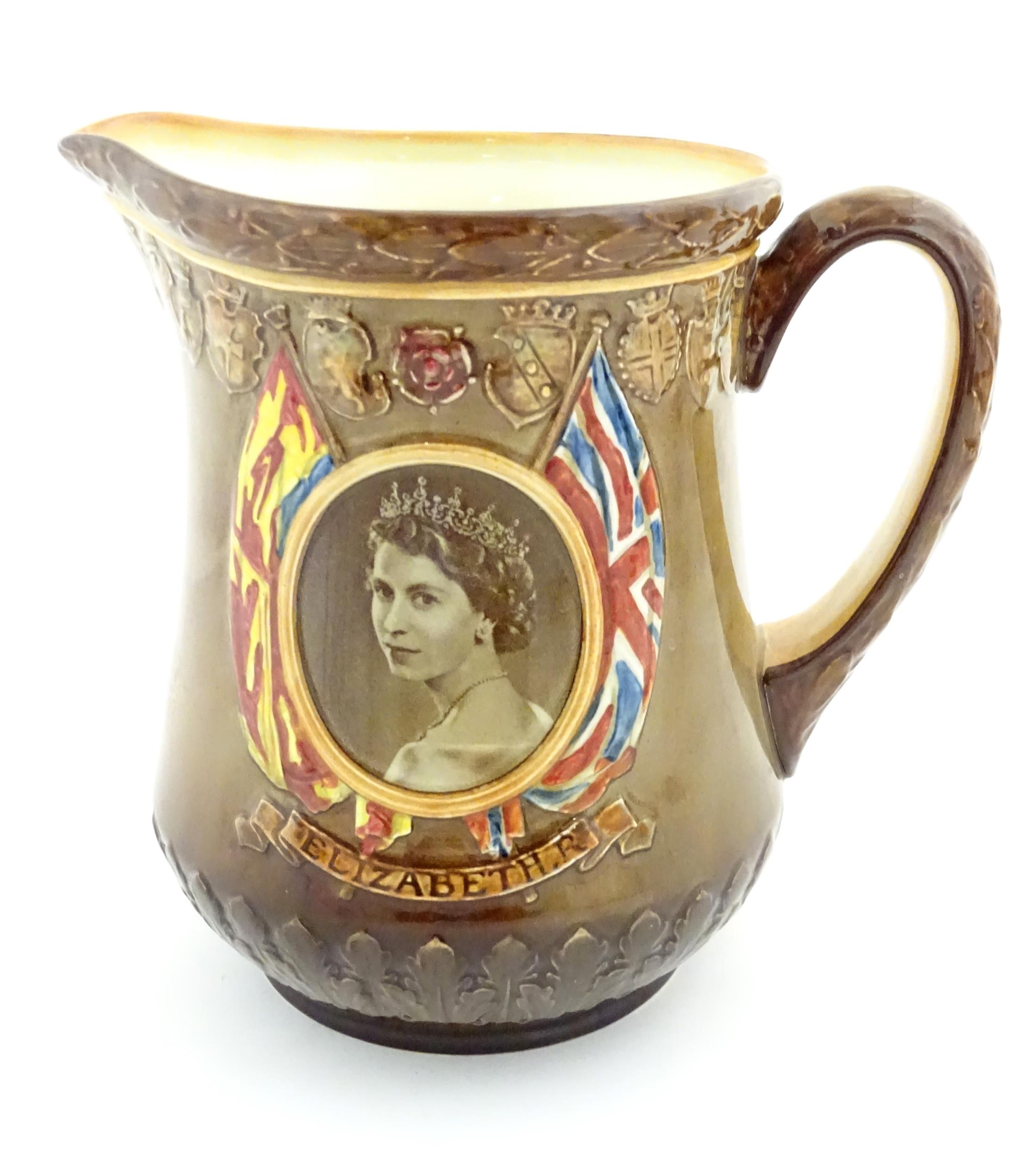 A Royal Doulton jug commemorating the Coronation of Queen Elizabeth II at Westminster Abbey, June