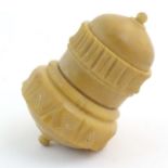 A Victorian carved coquilla nut sewing / thimble case modelled as a stylised acorn. Approx. 2 1/4"