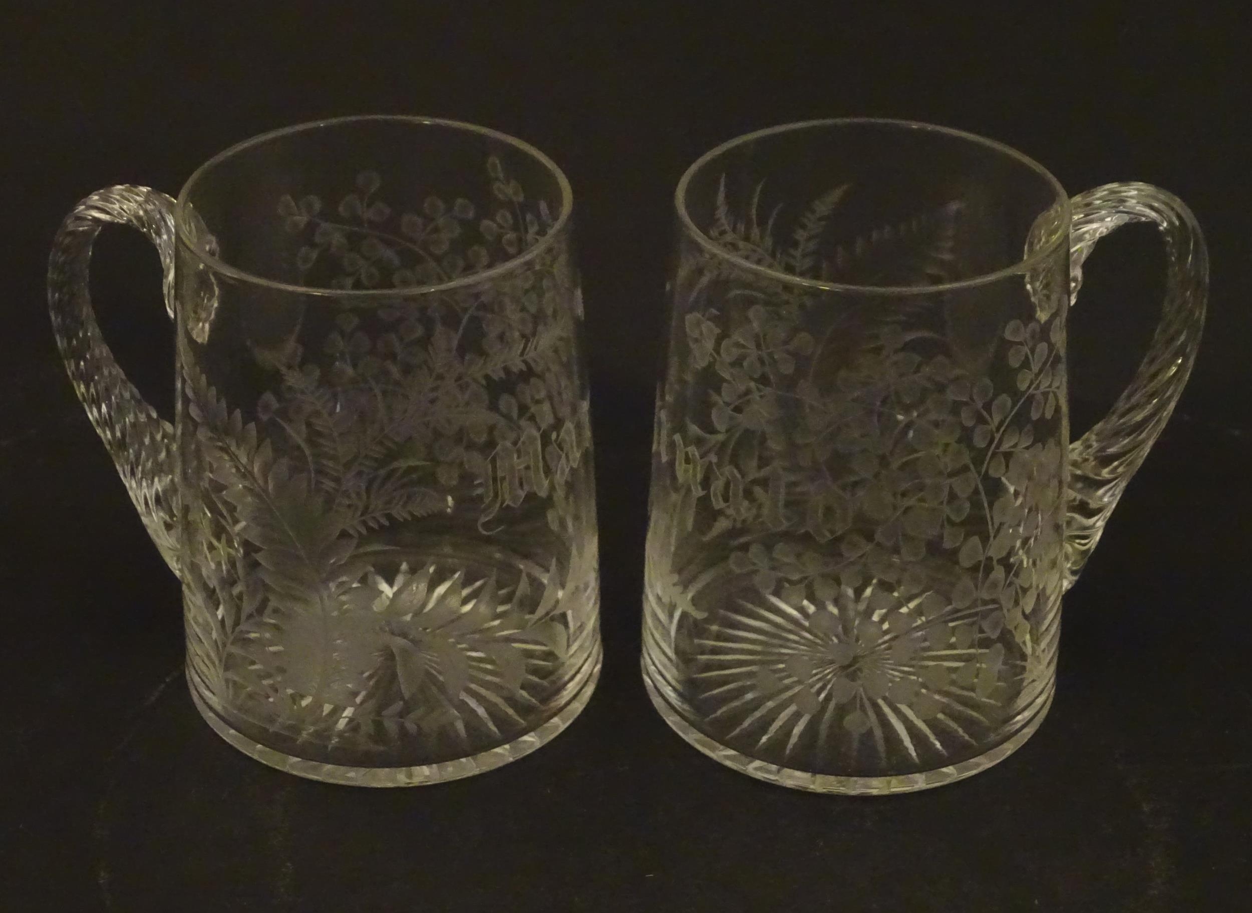 Two 19thC glass tankards with twist handles and engraved foliate decoration. One titled 'Mary', - Image 2 of 9