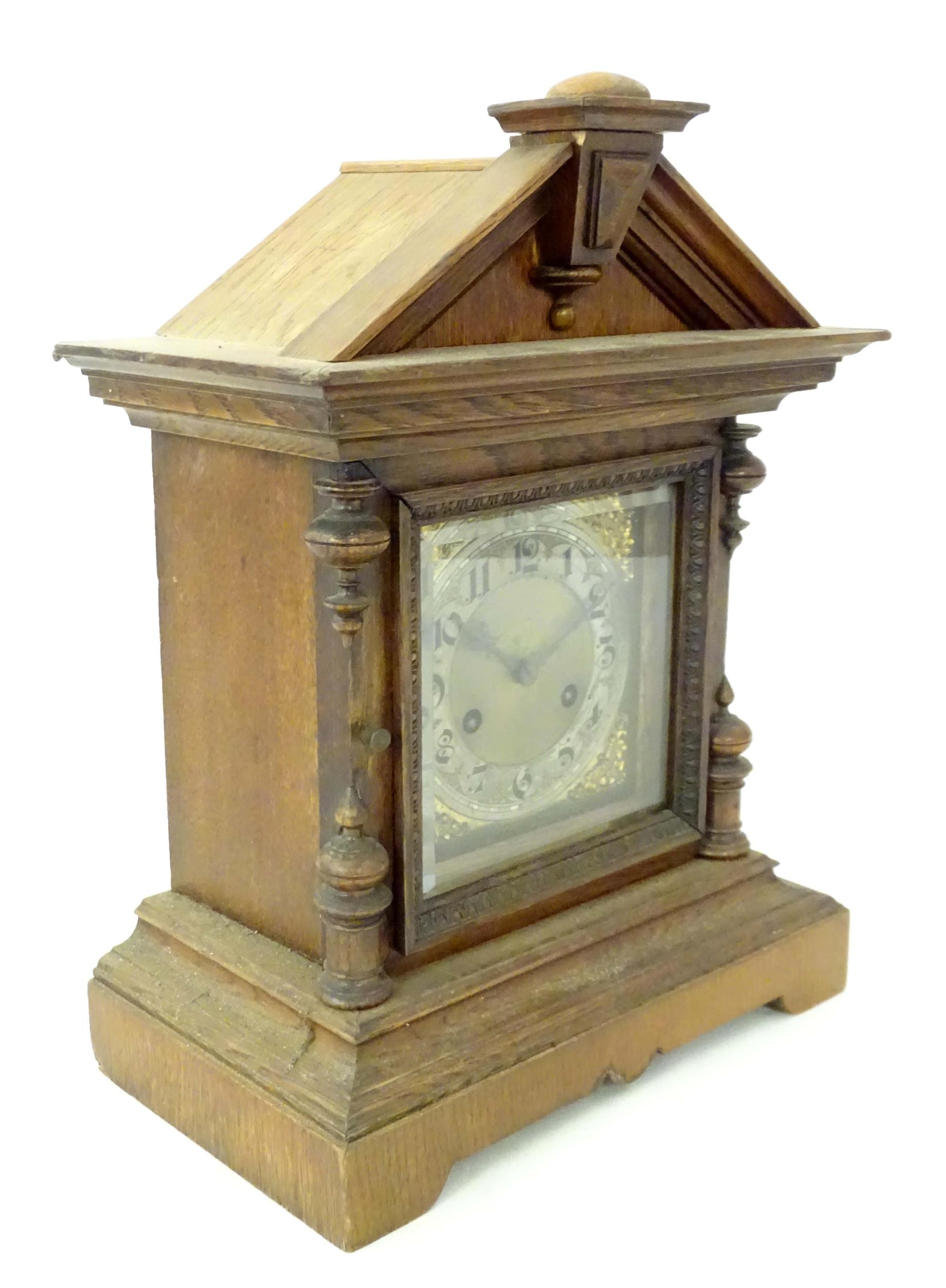 An oak cased Junghans mantel clock with silvered chapter ring having Arabic numerals and striking on - Image 2 of 9