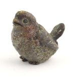 A cold painted bronze model of a song bird. Approx. 1" high Please Note - we do not make reference