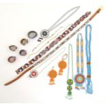 A quantity of assorted Native American bead jewellery to include disc necklaces, bracelets, belts