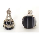A silver pendant fob seal set with banded agate under. Approx. 1 1/4" long Please Note - we do not