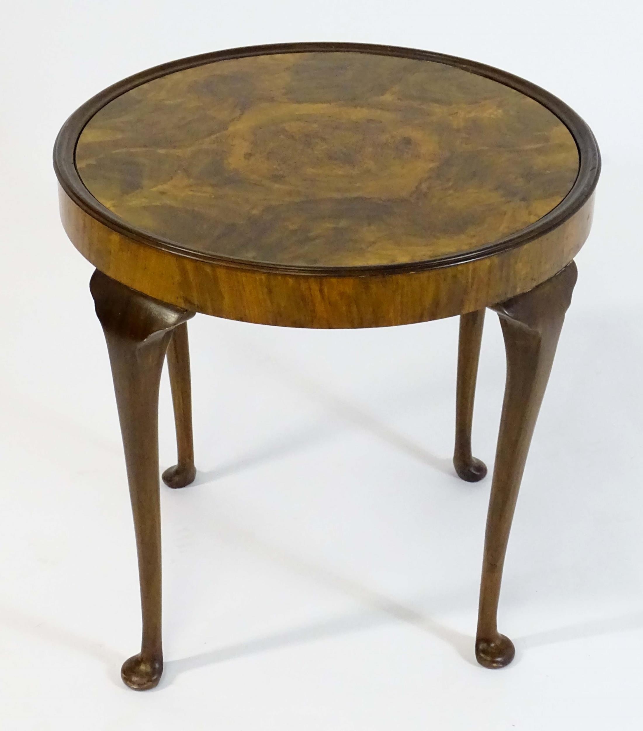 An early / mid 20thC walnut occasional / games table with a reversible top above four cabriole - Image 7 of 8