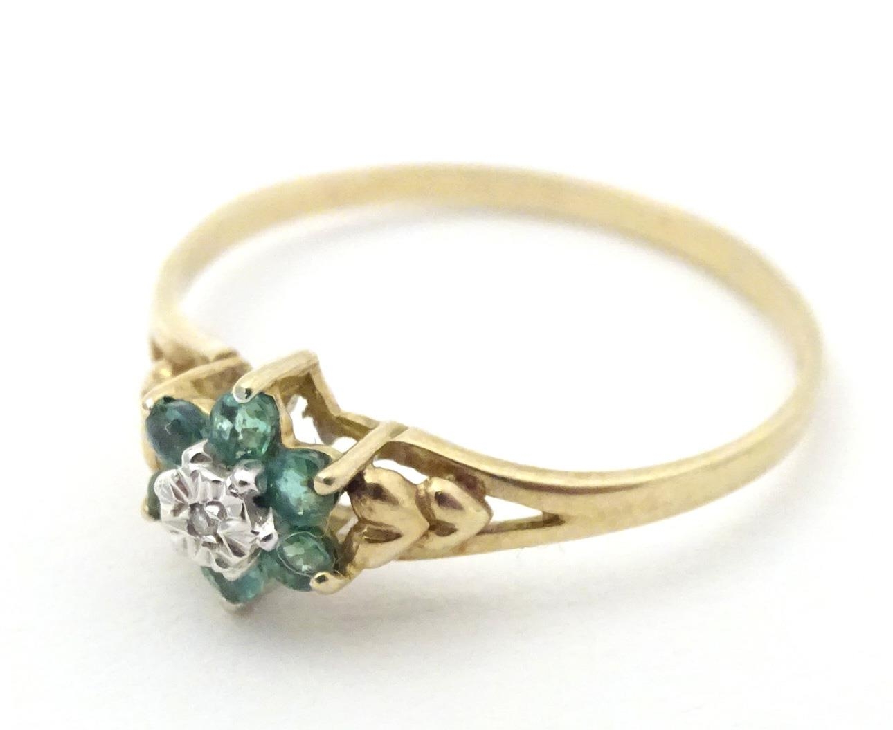 A 9ct gold ring set with central diamond bordered by emeralds. Ring size approx. S 1/2 Please Note - - Image 3 of 6