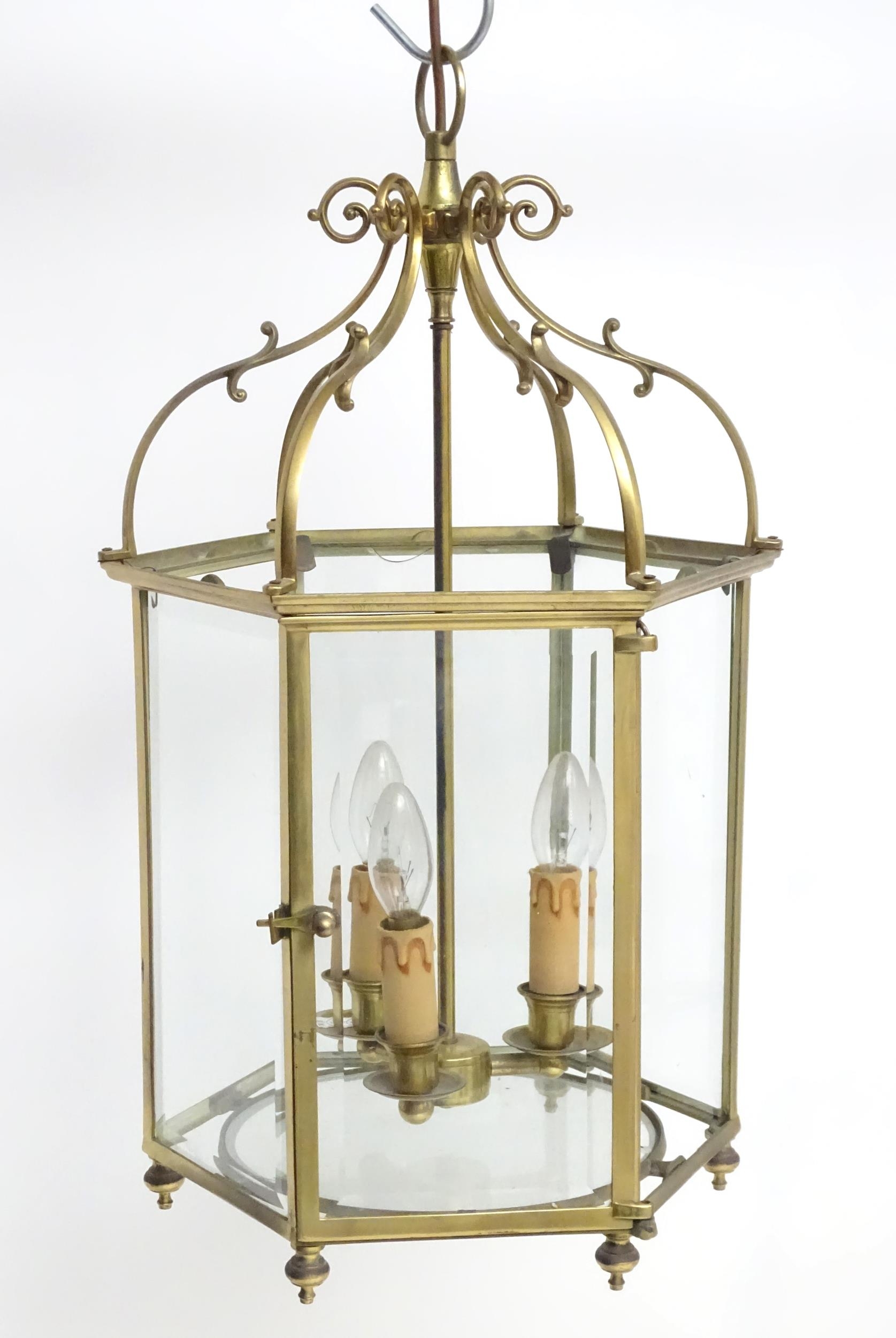 A 20thC pendant lantern ceiling light, the brass octagonal frame with bevelled glass panes, the - Image 4 of 7