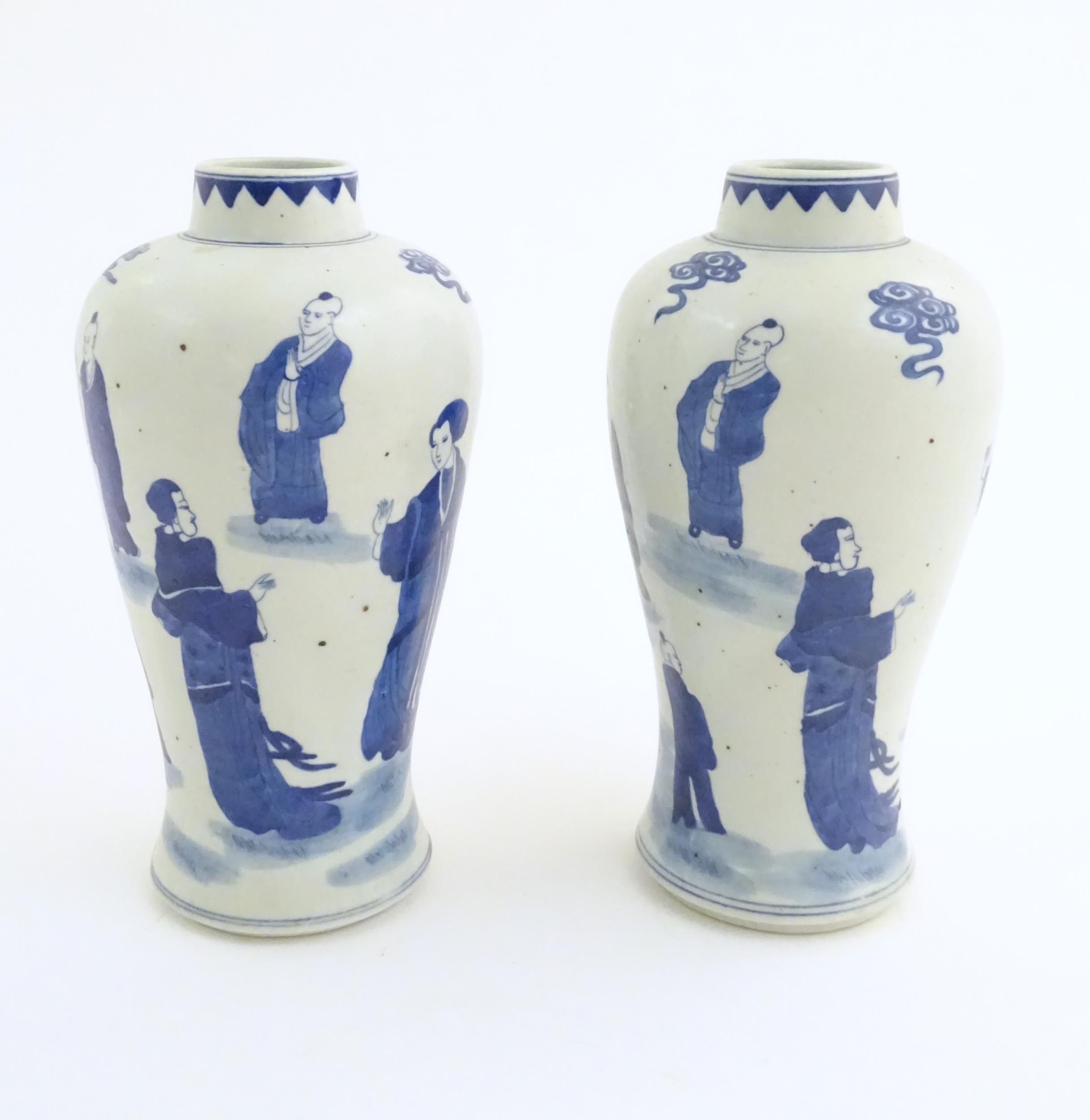 A pair of Chinese blue and white vases decorated with a Chinese dragon parade with figures in a - Image 5 of 6