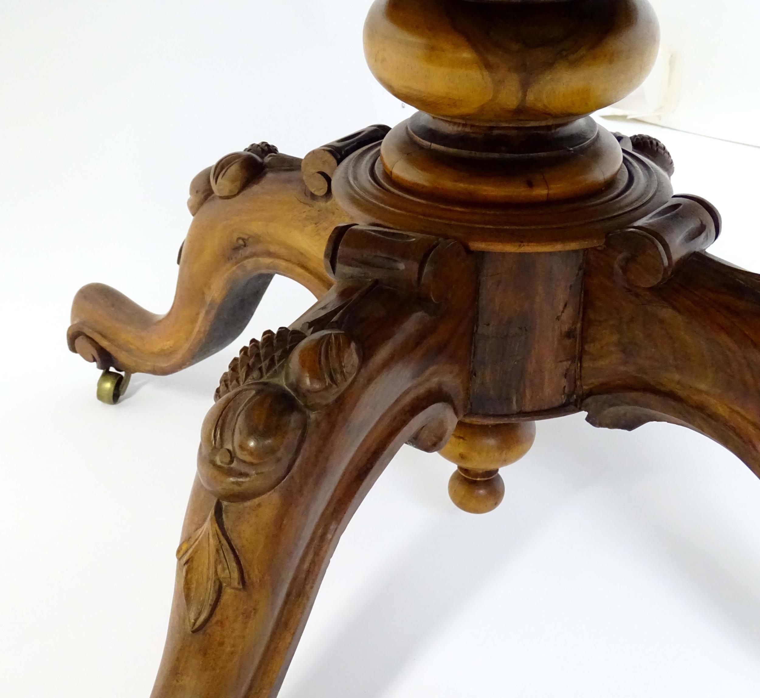 A mid 19thC walnut loo table with a burr walnut veneered top above a turned pedestal base and four - Image 5 of 12